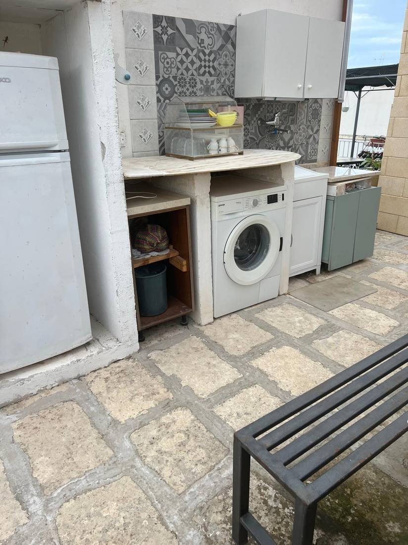 Angolo lavanderia sul terrazzo esterno